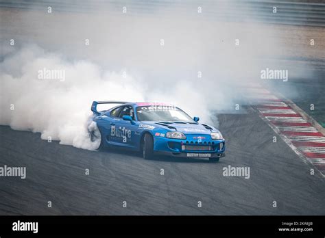 Toyota Supra, it's an A80 MK4 drifting in the circuit Stock Photo - Alamy