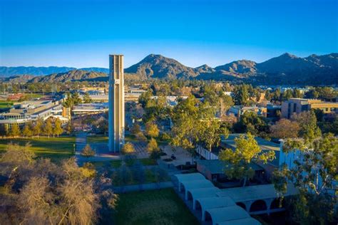 Aerial view of UCR Campus, Bell Tower and mountains | California Teach ...