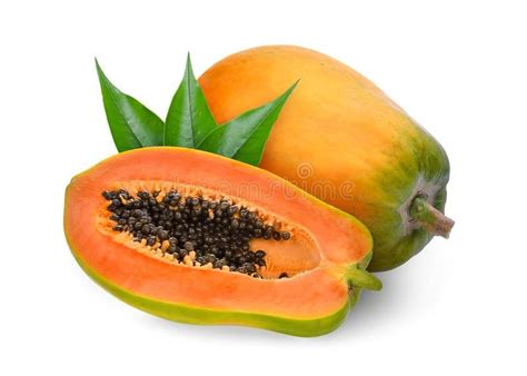 Whole and half ripe papaya with green leaves isolated on white ...