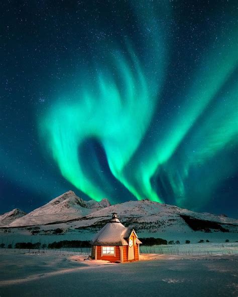 Aurora Borealis above a small cabin in Norway : MostBeautiful