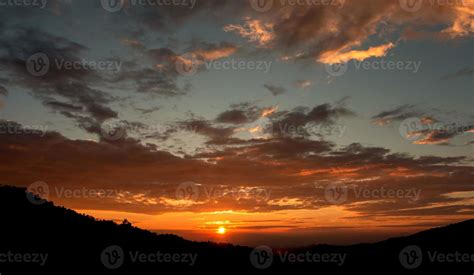 sunset sky with clouds and golden light 13841936 Stock Photo at Vecteezy