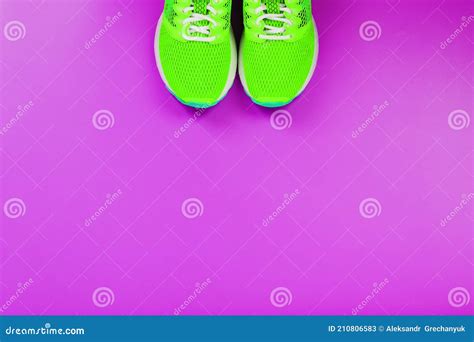 Green Running Shoes on a Purple Background Stock Image - Image of blue, object: 210806583