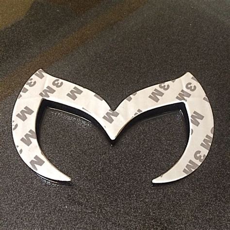 New Mazda Logo Steel Badge., Car Accessories on Carousell