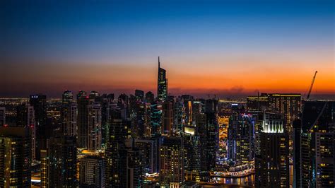 Download wallpaper 2560x1440 night city, skyscrapers, sunset, aerial ...