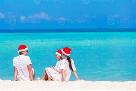 Christmas Family vacation on white beach 17712245 Stock Photo at Vecteezy