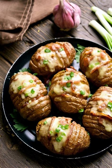 Baked Stuffed Potatoes with Bacon, Green Onion and Cheese Stock Photo ...