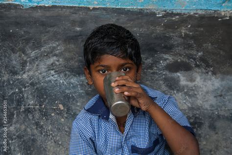 Indian School Children drinking water Stock Photo | Adobe Stock