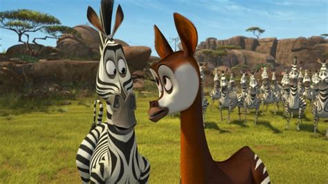 an animated giraffe standing next to a zebra in front of a herd of zebras