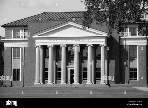 The Impressive Greek Revival style Robert C Khayat Law Center building with Oak tree branch on ...