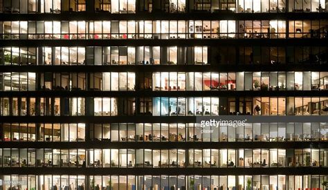 Office windows by night | Office window, Building facade, Night window