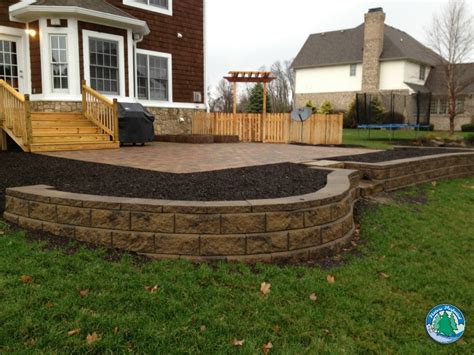 Raised Patios Are A Beautiful Option for Sloped Backyards - Eagleson Landscape Co.