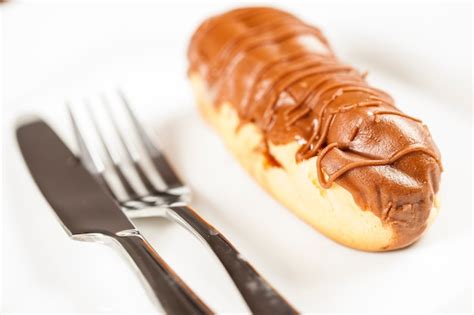 Premium Photo | Chocolate eclair with chocolate filling