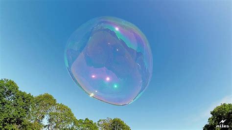 Giant Bubble in HD popped by a fly in slow-motion - YouTube