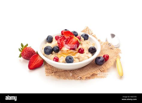 Oatmeal and fresh fruits Stock Photo - Alamy