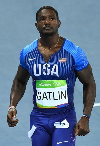 USA's Justin Gatlin looks on after competing in the Men's 100m ...