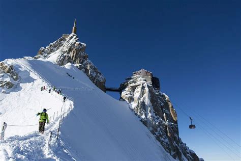 Skiers on the Aiguille du Midi Arête | Chamonix, Skiing, Mountain vacations