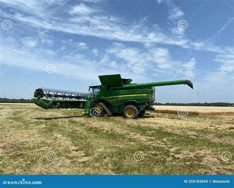 View of a John Deere Combine Harvester in the Field Under the Blue Sky Editorial Stock Image ...