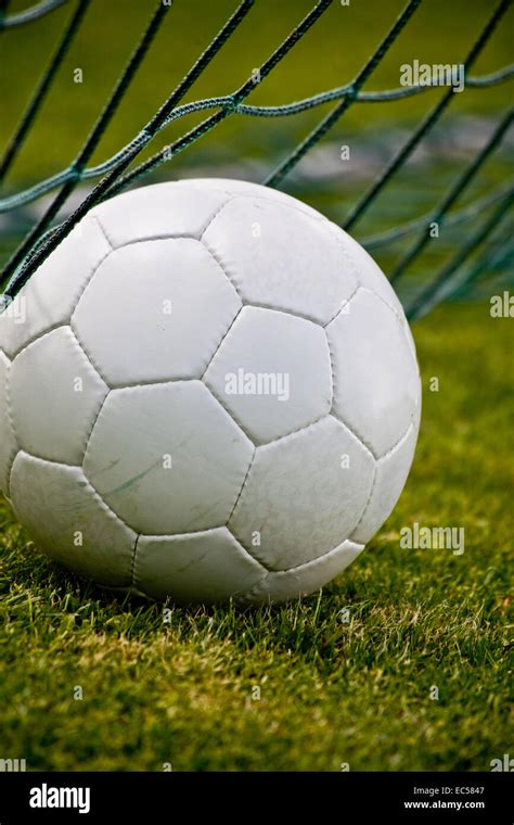 a soccer ball in the goal Stock Photo - Alamy