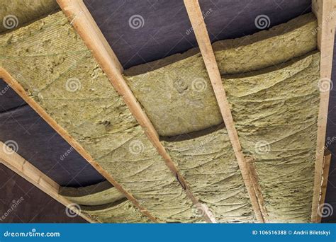 Thermal Insulation Mineral Rock Wool Installation at the New Building Attic Ceiling Stock Photo ...