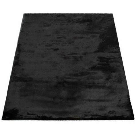 a black area rug on a white background
