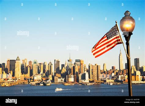 New York City skyline and American flag Stock Photo - Alamy