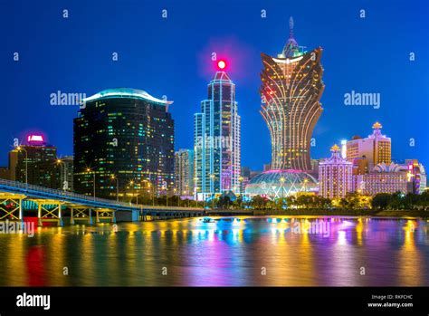 skyline of macau by the sea at night in china Stock Photo - Alamy