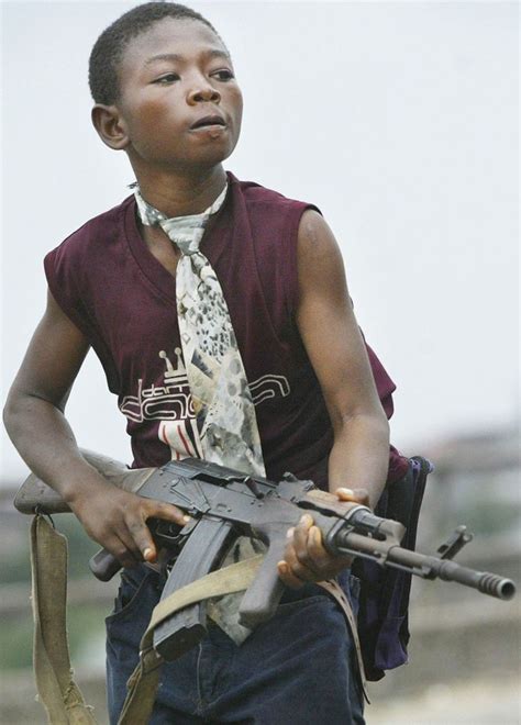 Child soldier West Africa. | Welcome To Thebes | African children, War ...