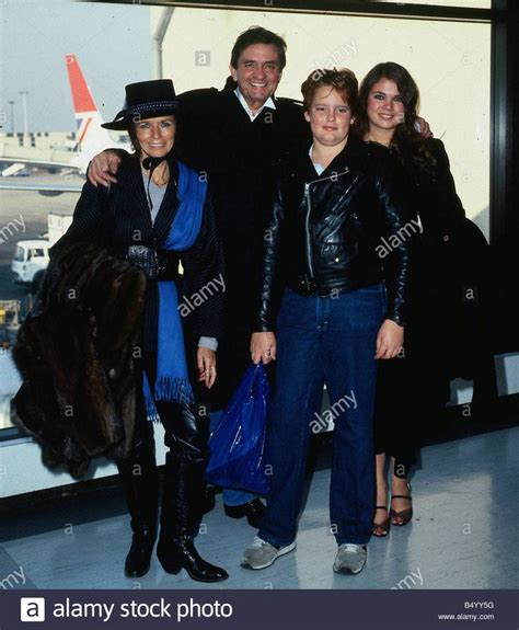 Stock Photo - Johnny Cash with family at airport April 1984 | Johnny ...