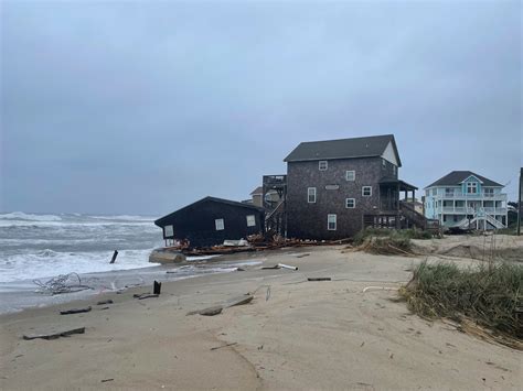 2 North Carolina beach houses collapse into the Atlantic surf