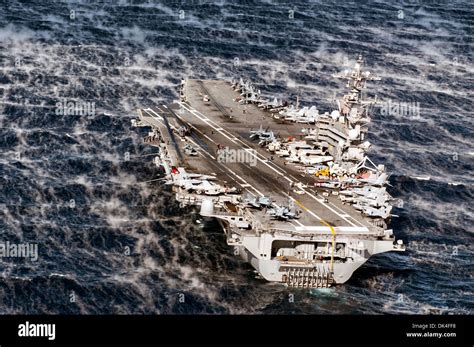 US Navy nuclear powered aircraft carrier USS George H.W. Bush steams ...