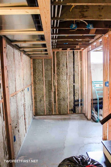 Framing a basement wall against concrete is not as hard as you think. Come see how we insulated ...