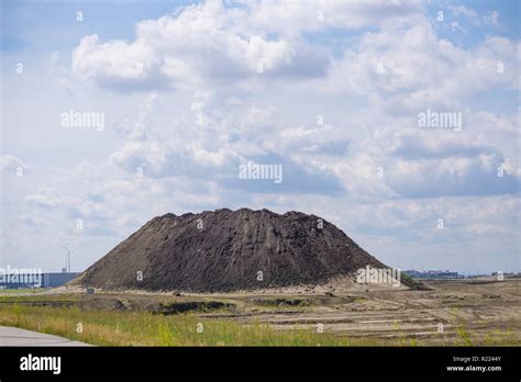 Pile of dirt on city construction site Stock Photo - Alamy