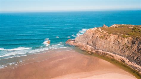 Cliffs over Beach on Sea Shore · Free Stock Photo