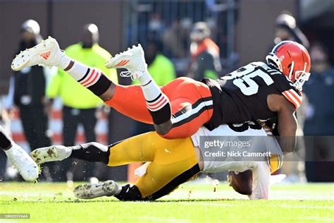 Myles Garrett of the Cleveland Browns sacks Kenny Pickett of the ...