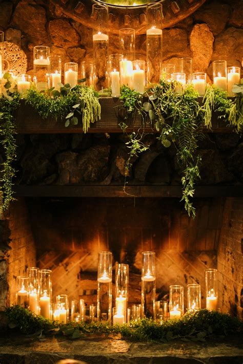 Reception Décor Photos - Fireplace Full of Candles - Inside Weddings