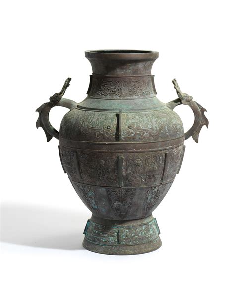 A MASSIVE ARCHAIC WESTERN ZHOU-STYLE BRONZE WINE VESSEL, HU , MING ...