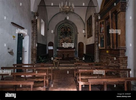 Interior of a simple medieval church with white walls Stock Photo - Alamy