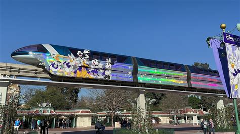 PHOTOS: Disneyland Monorail Debuts a New 100th Anniversary Wrap - WDW ...