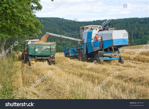 Blue Combine Working In The Field Stock Photo 39979291 : Shutterstock