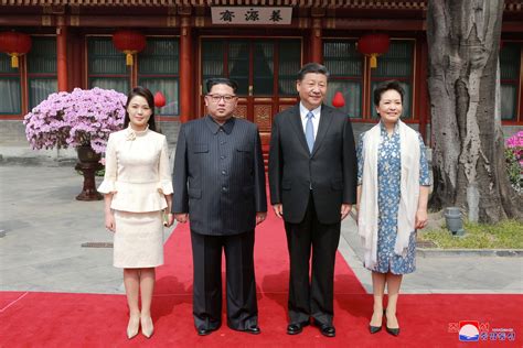 Kim Jong Un Wife's Stylish Fashion Sense is a Hit in China - Newsweek