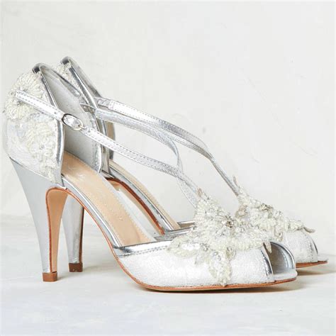 Are you interested in our Ivory lace wedding shoes? With our Ivory and silver shoes you need ...