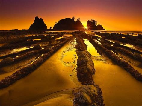 Sunset looming behind Point of Arches, Olympic National Park, USA ...