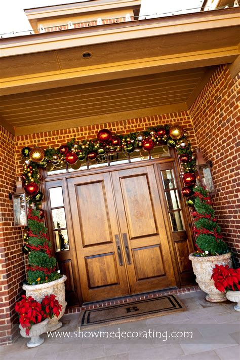 Christmas garland over a doorway. Stunning! www.showmedecorating.com ...