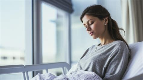 Premium AI Image | a pregnant woman in a hospital bed