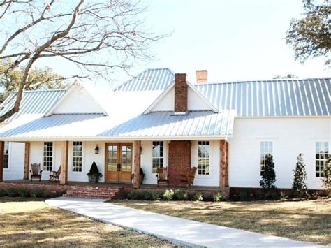 metal-roof-farmhouse-the-house-a-white-farmhouse-with-a-metal-white ...