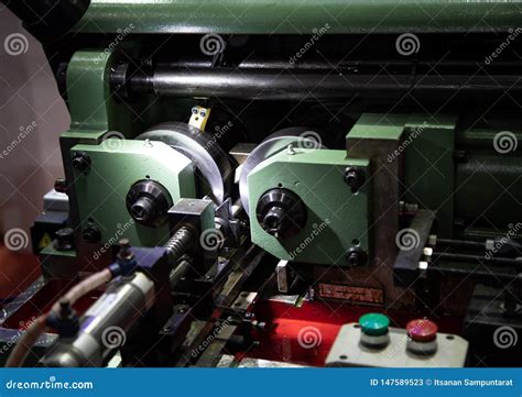 Thread rolling machine stock image. Image of rolling - 147589523