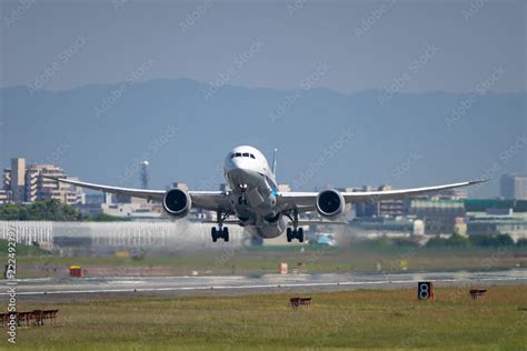 Boeing 787-8 takeoff Stock Photo | Adobe Stock