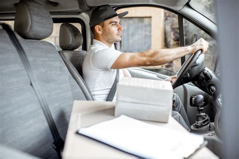 Driver Delivering Goods by Vehicle Stock Photo - Image of empty ...