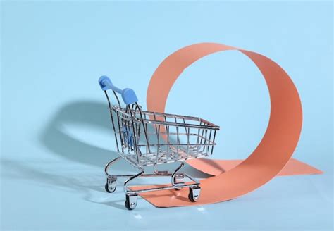 Premium Photo | Shopping cart on creative minimalistic background