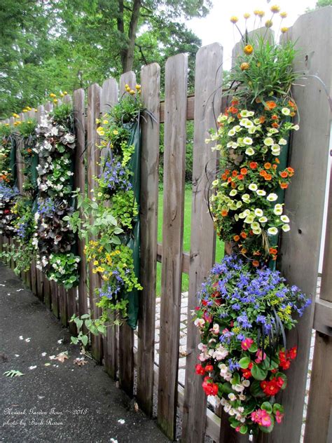 15 Easy and Wonderful Hanging Plants On Fence for Your Home Inspiration — BreakPR | Decorative ...